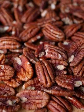 Raw organic pecan nuts pattern background. 스톡 사진