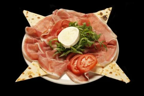Raw parma ham dish Stock Photos