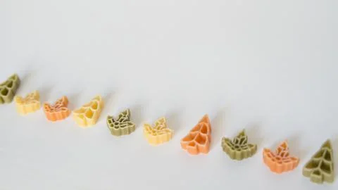 Raw pasta with assorted shapes and colors Stock Photos