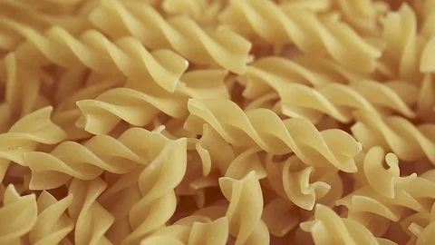 Raw pasta background Stock Footage 83759680