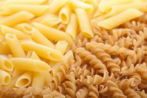 Raw pasta background Stock Photos