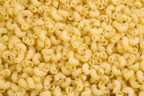 Raw pasta as background Stock Photos