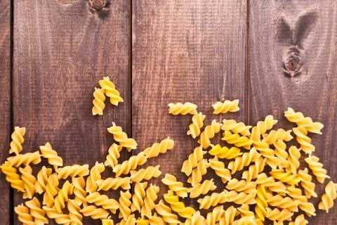 Raw pasta as a background Stock Photos