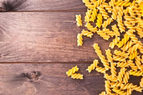 Raw pasta as a background Stock Photos