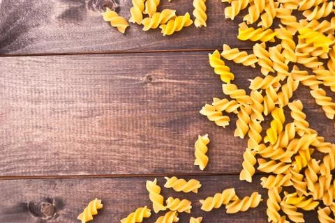 Raw pasta as a background Stock Photos