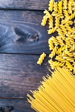 Raw pasta as a background Stock Photos