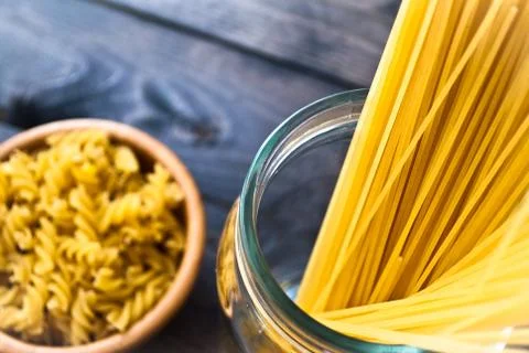 Raw pasta as a background Stock Photos