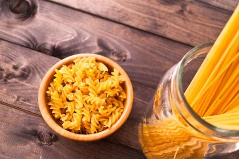 Raw pasta as a background Stock Photos
