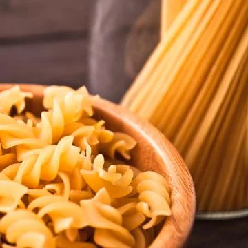 Raw pasta as a background Stock Photos