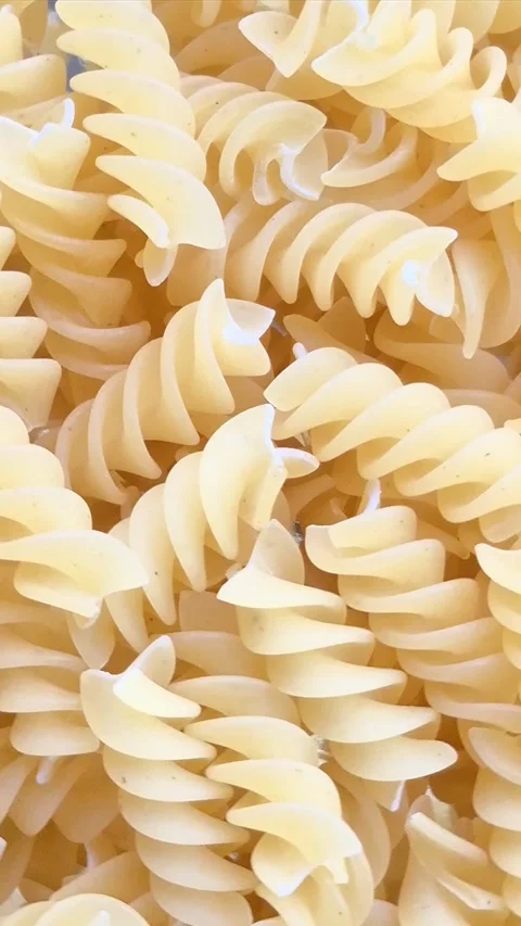 Raw pasta close-up in motion Stock Footage 304677189