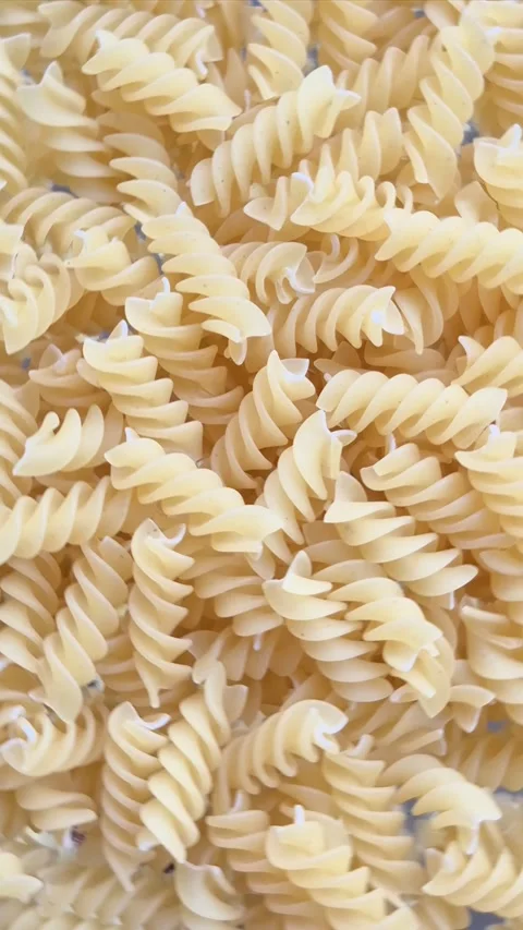 Raw pasta close-up in motion Stock Footage 304677537