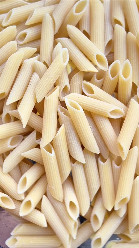 Raw pasta close-up in motion Stock Footage 304677643
