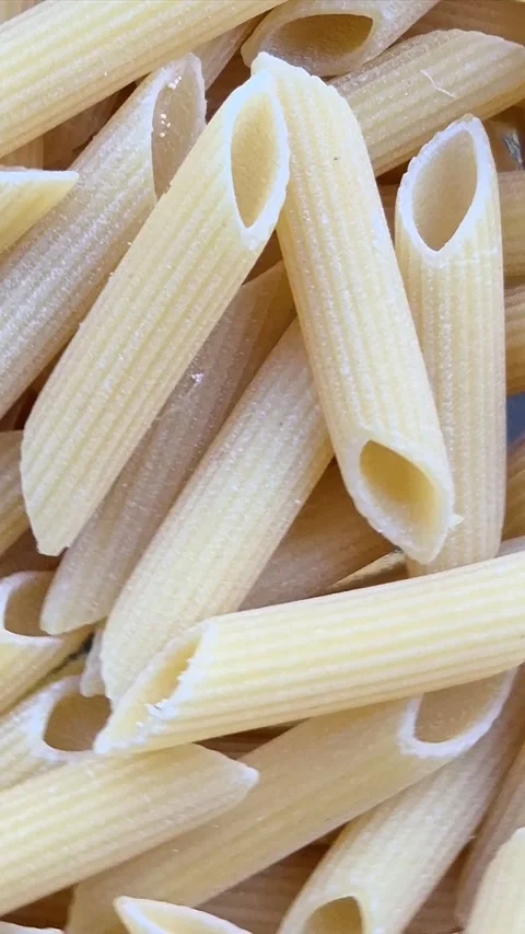 Raw pasta close-up in motion Stock Footage 304677665