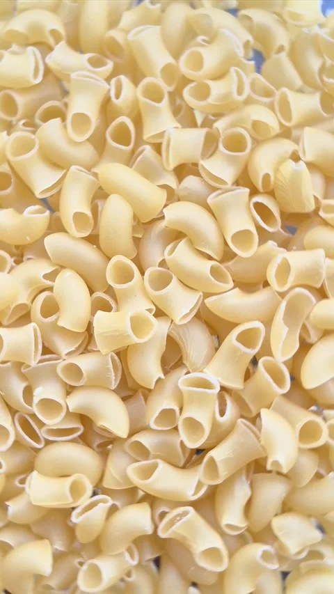 Raw pasta close-up in motion Stock Footage 304678057