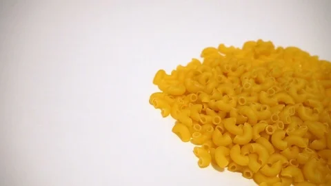 Raw pasta on white background. 2 Stock Footage 98154547