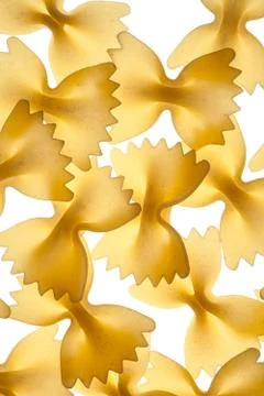 Raw pasta on white background Stock Photos