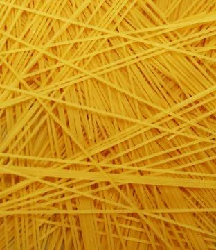 Raw pasta as whole background Stock Photos