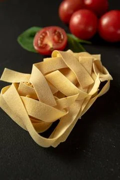 Raw paste Pappardelle close-up vertical shot. Flat lay Photos