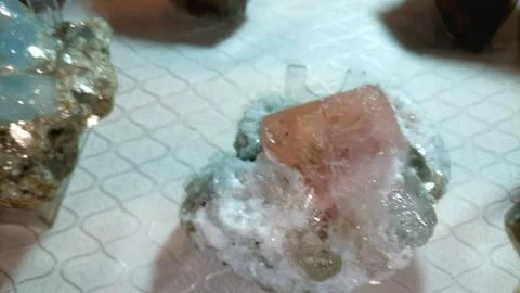Raw Peach Colored Crystal Specimen On White Natural Mineral Matrix Stock Photos