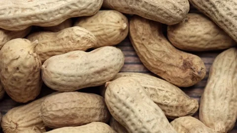 Raw Peanuts And Open Nut. Panning Dolly Slider Shot. Top View. Macro. 4k, 60 FPS Stock Footage 244540340