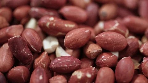 Raw peanuts as background Stock Footage 100894720