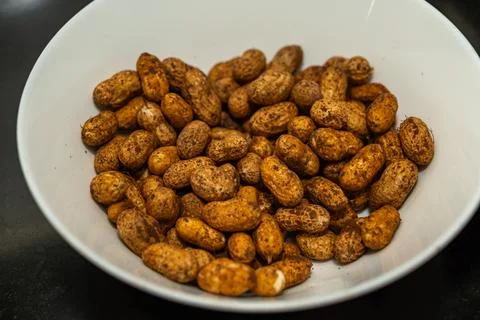 Raw Peanuts in Bowl Stock Photos