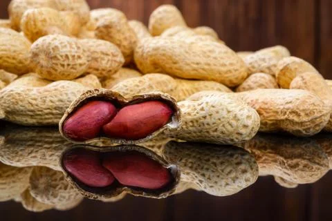 Raw peanuts or arachis Stock Photos