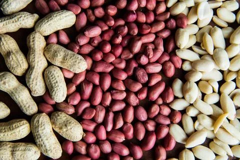 Raw peanuts or arachis on the table Stock Photos