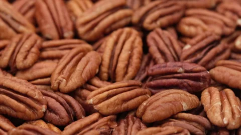 Raw pecan nuts close up. Healthy food concept. 4K UHD video Stock Footage 153507944