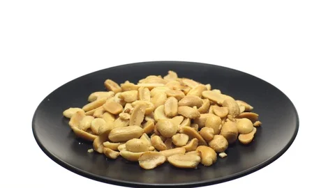 Raw peeled peanuts fried with salt. Rotation. Snack closeup. Stock Footage 102206153