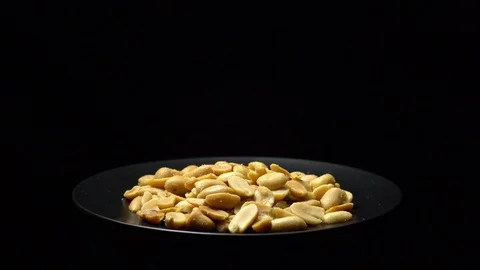 Raw peeled peanuts fried with salt.  Rotation. Snack closeup. Peanuts in a bowl. Stock Footage 102206802