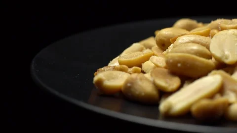 Raw peeled peanuts fried with salt.  Rotation. Snack closeup. Peanuts in a bowl. Stock Footage 102206829