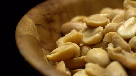 Raw peeled peanuts fried with salt.  Rotation. Snack closeup. Peanuts in a bowl. Stock Footage 102208062