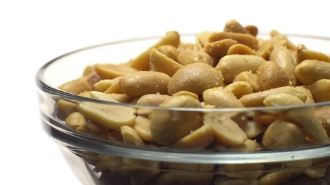 Raw peeled peanuts fried with salt. Rotation. Snack closeup. Stock Footage 102234385