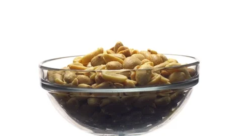 Raw peeled peanuts fried with salt. Rotation. Snack closeup. Stock Footage 102234396