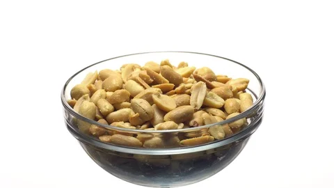 Raw peeled peanuts fried with salt. Rotation. Snack closeup. Stock Footage 102234598