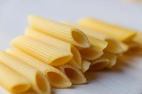 Raw Penne Rigate Stock Photos