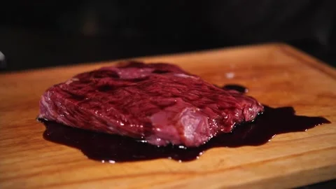 Raw piece of beef pour soy sauce Stock Footage 159242517