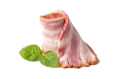 Raw piece of fresh bacon with basil leaf green isolated on a white background Stock Photos