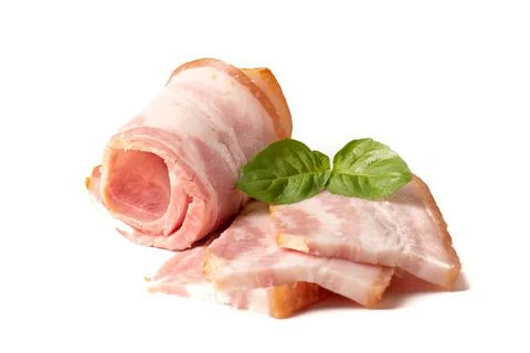Raw piece of fresh bacon with basil leaf green isolated on a white background Stock Photos