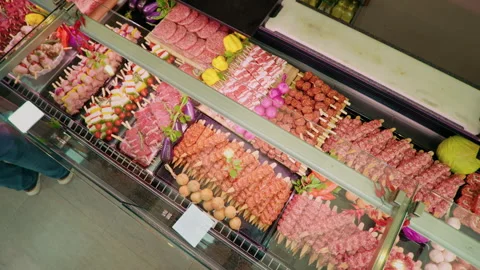 Raw piece of meat beef steak and turkish kebab with fresh juicy vegetables. Stock Footage 295273487