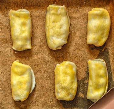Raw pies on a baking sheet Foto stock