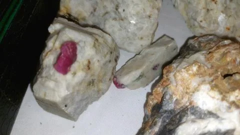 Raw Pink Ruby Crystal Embedded In Natural White Rock Matrix Stock Photos
