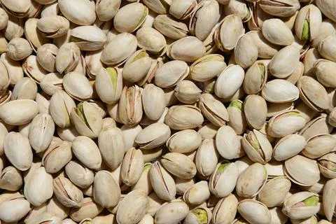Raw pistachios nuts, top view. Stock Photos