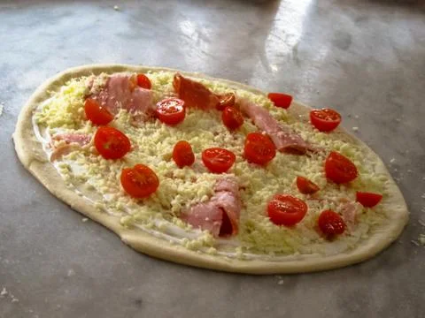 Raw Pizza. Closeup. Stock Photos