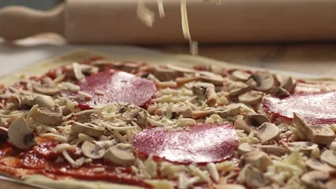 Raw pizza with toppings. Stock Footage 266900886