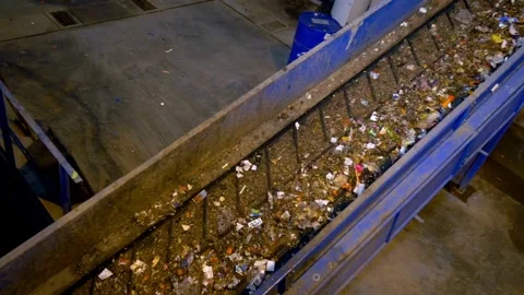 Raw plastic trash in conveyor recycling environment environmental green garbage 動画素材 334661083