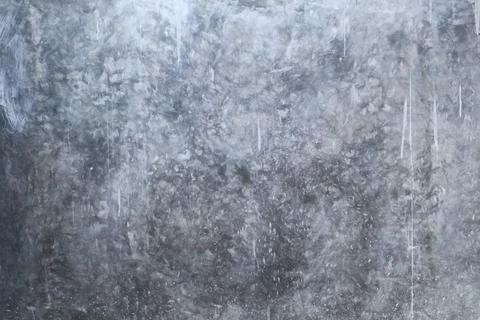 Raw polished concrete wall texture with mottled gray tones and white paint .. Stock Photos