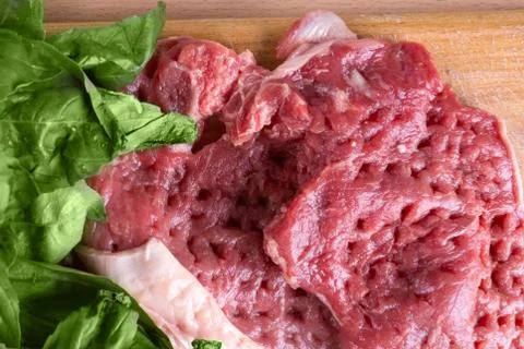 Raw pork and basil Stock Photos