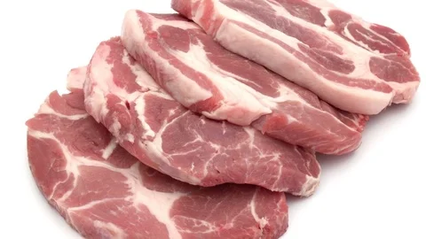 Raw pork chop meat on white background Stock Footage 71576226